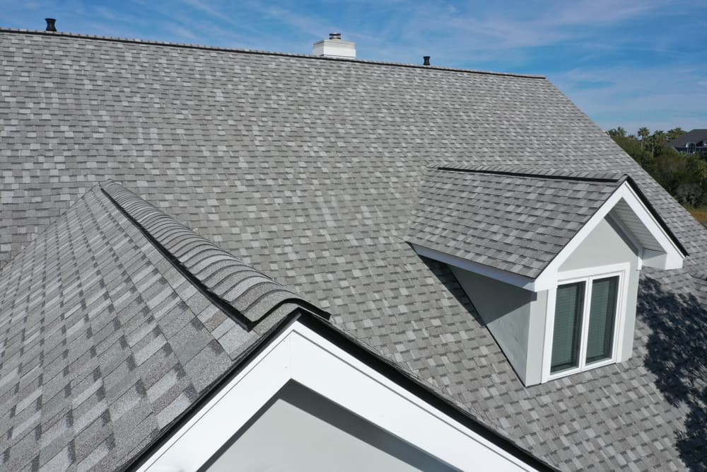 Battle Born crew coating a shingle roof in Northern Nevada