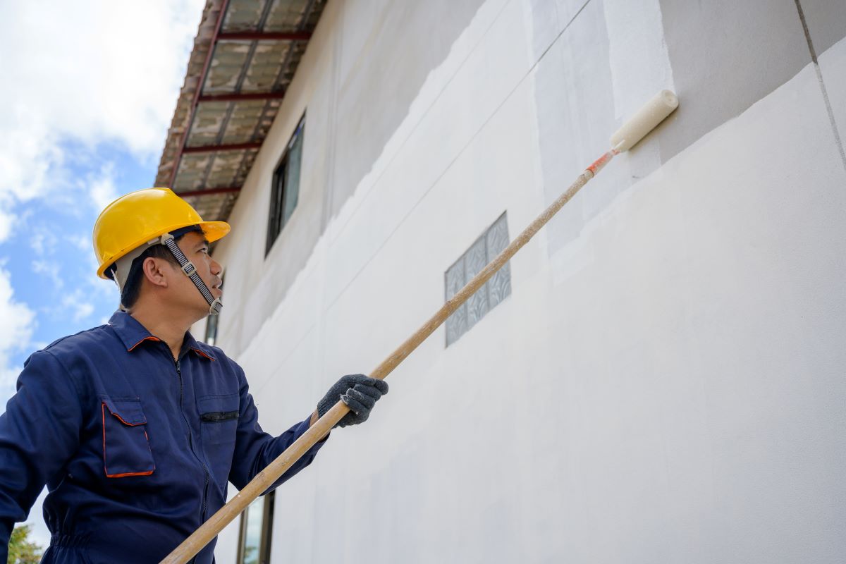 Professional painting a house in Reno, Nevada