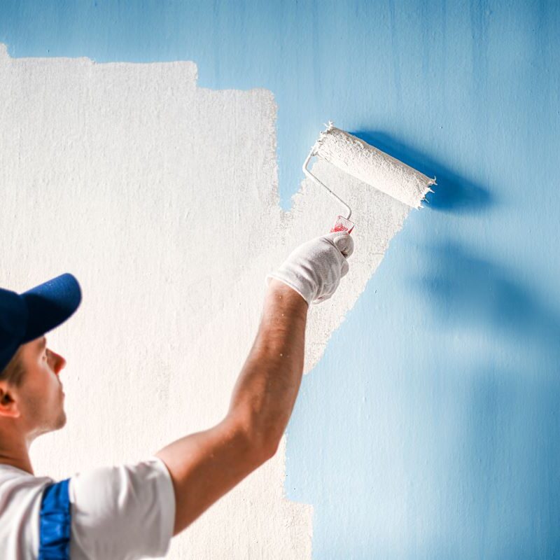 Man painting a house in Reno, Nevada